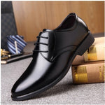 Black men's casual fashion shoes with a sleek pointed toe